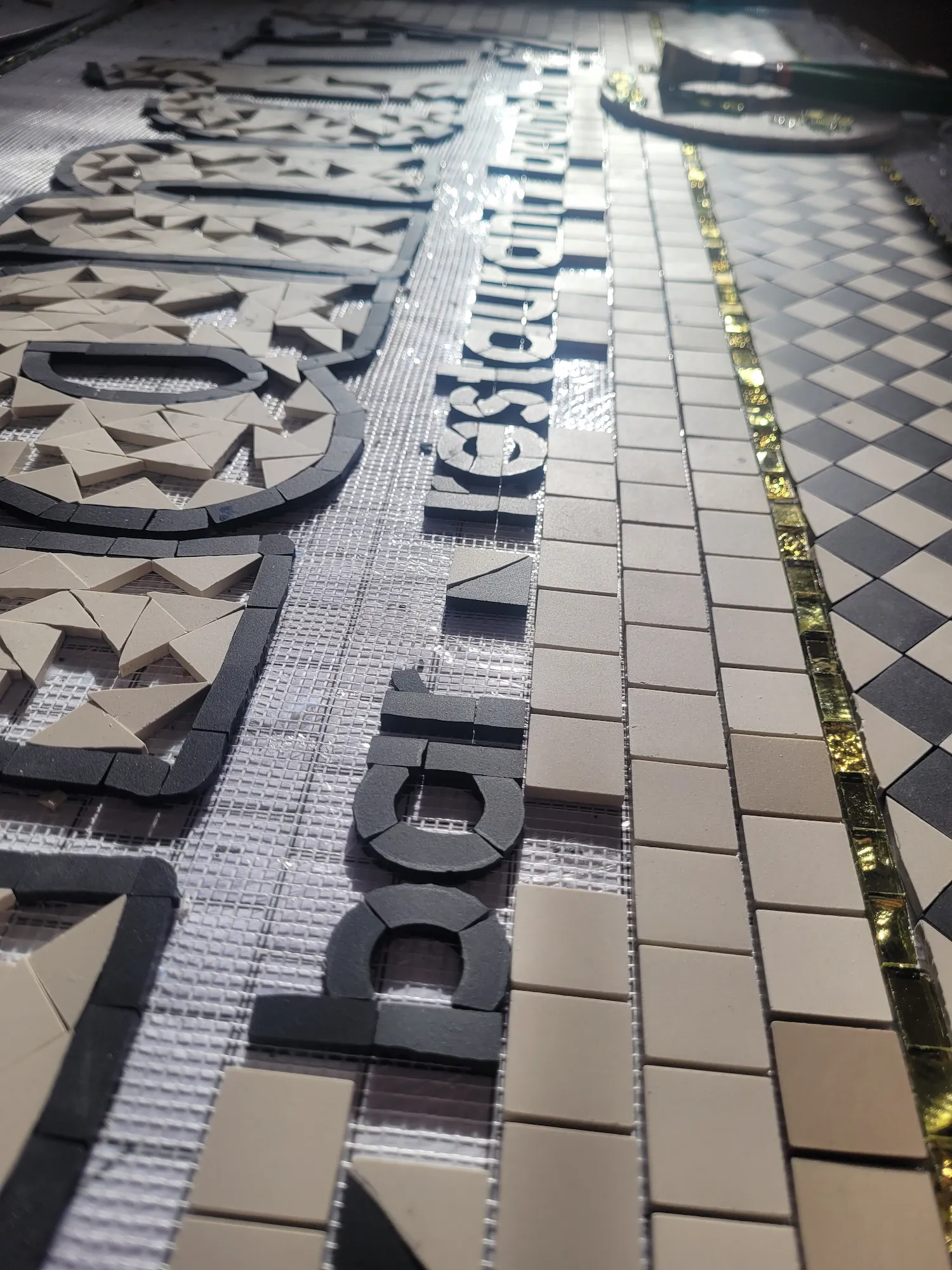 Réalisation du tapis d'entrée du restaurant HANDY